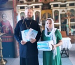 На юге Астраханской области храм подарил двум школам учебники по православной культуре