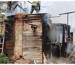 Возле одного из астраханских рынков на один дом и гараж стало меньше