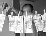 Двое мужчин купили фальшивые деньги и приехали их тратить в Астрахань