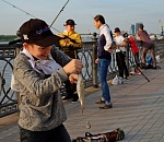 Рекорд юбилейного фестиваля "Вобла" в Астрахани - сто маленьких рыбаков. Фоторепортаж