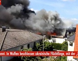Украинские беженцы в Германии вместе с российским флагом спалили дом, в котором их приютили