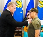 В честь Дня Конституции отличившимся в боях астраханцам вручили награды, а молодым жителям региона – паспорта