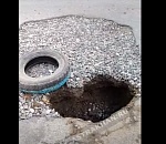 После мощного ливня на астраханской улице образовался провал: видео