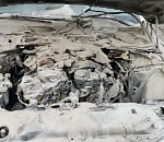 В Астрахани у ТЦ "Ярмарка" дотла сгорела BMW