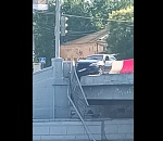 В Астрахани машина снесла ограждение моста и повисла над водой
