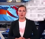 Скандал на Первом канале: в прямом эфире новостей выбежала девушка с антивоенным плакатом